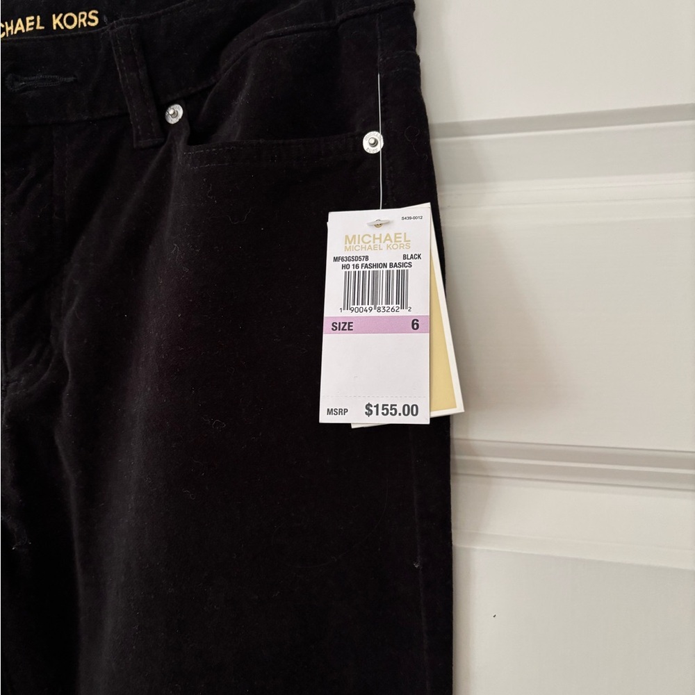 Michael Kors Black Fine corduroy flare bottom leg mid rise. Brand new with tags